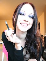 Liz Vicious enjoying a smoke and showing pussy