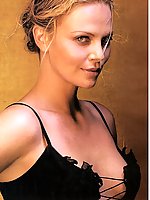 Charlize Theron is naked, her tongue is out and she's ready